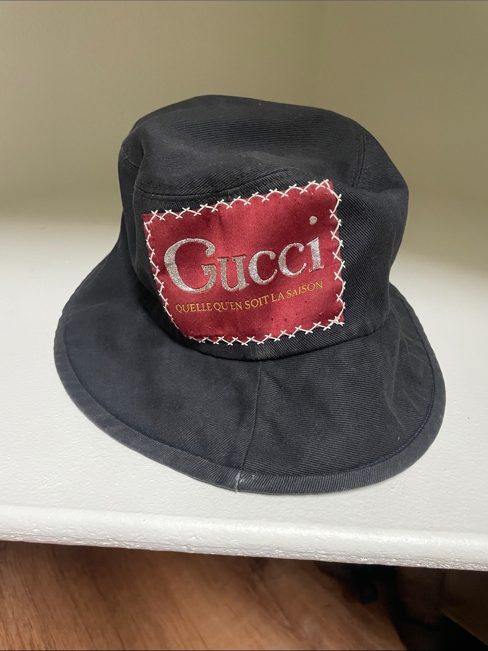 Gucci Black Bucket Hat with Red Logo Patch and White Stitching